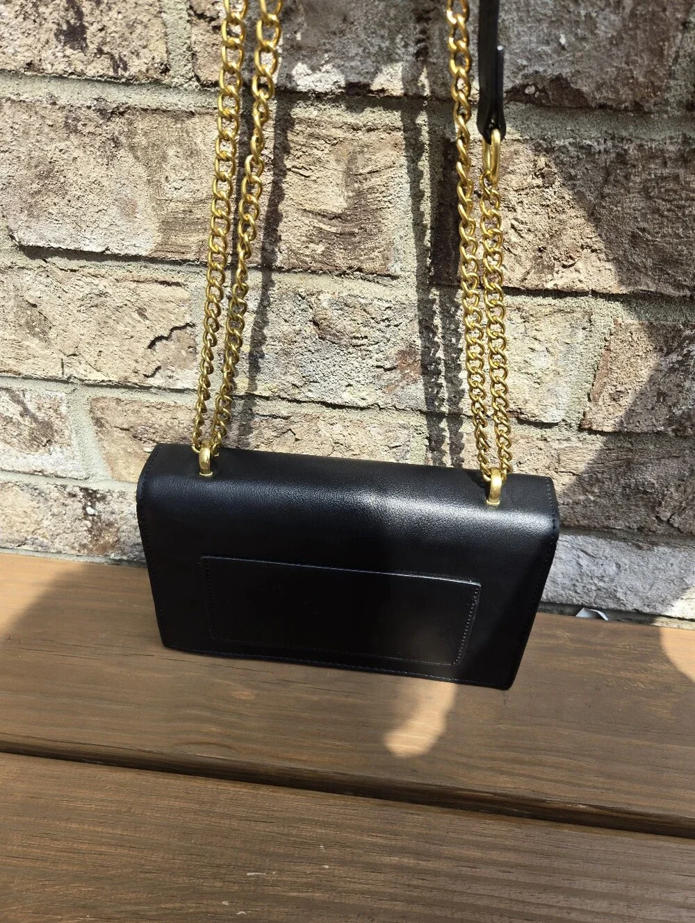 Structured Black Shoulder Bag with Gold Hardware